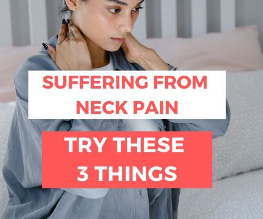 Woman on bed holding her neck in pain